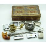 Hallmarked silver button hook, hallmarked silver sugar tongs, stamp case marked sterling silver,