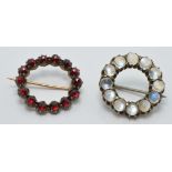 Two Victorian brooches, one set with moonstone cabochons the other Bohemian cut garnets