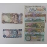 A group of States of Guernsey banknotes to include two Hoddes 1969-75 £1 notes, E and F prefixes,