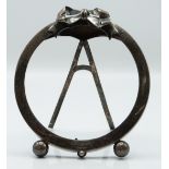 Victorian hallmarked silver circular photograph frame with ribbon finial and easel back,