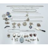 A collection of silver jewellery including enamel pendant, Edwardian silver swallow brooch,