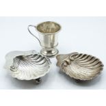 Three pieces of hallmarked silver including a pedestal tankard and two shell dishes, Birmingham,