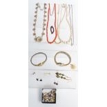 A collection of jewellery including coral, garnet brooch, earrings etc