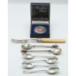 Set of four hallmarked silver teaspoons with shell bowls, hallmarked silver fork and a white metal