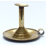 17thC riveted brass chamberstick of stepped form, height 17cm, diameter 20cm