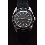 Dogma skin diver wristwatch with date aperture, luminous hands, two tone hour markers, black dial,