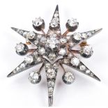 Victorian metamorphic star pendant/ brooch set with old cut diamonds, the largest approximately 0.