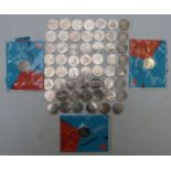 A collection of fifty eight 2011 Olympic games 50p coins, 24 types - missing Judo, Weightlifting,