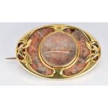 Art Nouveau gold brooch set with quartz with a glass compartment to the centre verso engraved M.H.