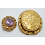 Victorian brooch set with two glass compartments and a Victorian brooch set with an amethyst, length