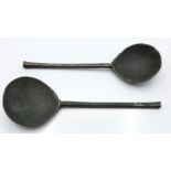 A near pair of 17th/18thC pewter spoons with touchmarks, one DG the other possibly the same but