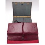 Red leather silk lined travelling valet case marked with gilt script, handkerchiefs, ties and