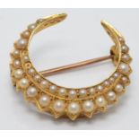 Victorian/ Edwardian crescent brooch set with seed pearls, diameter 2.5cm, 3.8g