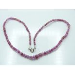 A beaded pink sapphire necklace