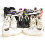 Eight pairs of Nike trainers including Air Force-1 (UK 7), black Air Max (UK 5),  purple, green,
