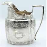 Victorian Irish hallmarked silver cream or milk jug with bright cut decoration, Dublin 1897 maker