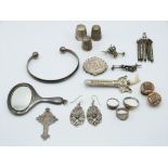 A collection of silver jewellery including rings, pendants, earrings, bangle, Victorian brooch