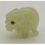 Likely Russian Fabergé miniature jadeite model of an elephant set with sapphire eyes, length 17mm
