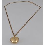 A 9ct gold necklace and 9ct gold heart locket, 9.7g