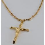 A 9ct gold chain and 9ct gold crucifix, 7.2g