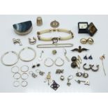 A pair of Christian Dior earrings, a pair of agate cufflinks, silver earrings, silver RAF brooch,