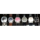 Six gentleman's wristwatches comprising Seiko 5, Ricoh and Citizen, all automatic with day date