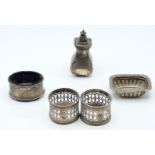 Pair of Victorian hallmarked silver napkin rings with pierced decoration, Birmingham 1865 maker