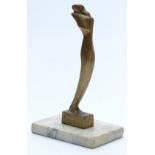 Art Deco bronze figure raised on marble base with impressed MT signature, height 25cm