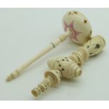 Two 19thC Indian Madras ware ivory baby's rattles, longest 9.5cm