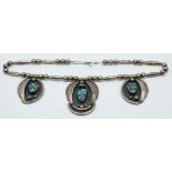 A c1920 Native American Navajo silver necklace set with turquoise, 81.1g, 44cm