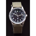 British RAF military style wristwatch with luminous hands and hour markers, white Arabic numerals,