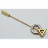 A yellow metal bi-coloured stick pin set with diamonds marked 333, length 5cm, 1.8g