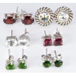 Six pairs of silver earrings set with tourmaline, garnet, aquamarine, etc