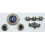 Celtic silver brooch set with sodalite, a pair of matching earrings and two white metal