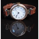 9ct gold ladies wristwatch with blued hands, black Arabic numerals, gilt minute markers. white