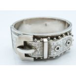 Victorian hallmarked silver bangle in the form of a buckle, with engraved decoration