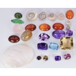 An aquamarine, jade cabochons, five amethysts, two citrines, garnets, agate, etc