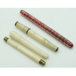 Four 19thC turned ivory needle cases, longest 11cm