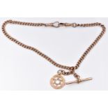 A 9ct rose gold Albert/ watch chain with 9ct gold charm/ pendant, 34g