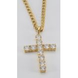 A 9ct gold necklace/ chain, (3.6g) and a 14k gold cross set with cubic zirconia, (4.8g)