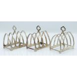 Art Deco set of three five bar hallmarked silver toast racks, London 1933 maker Sir John Bennett