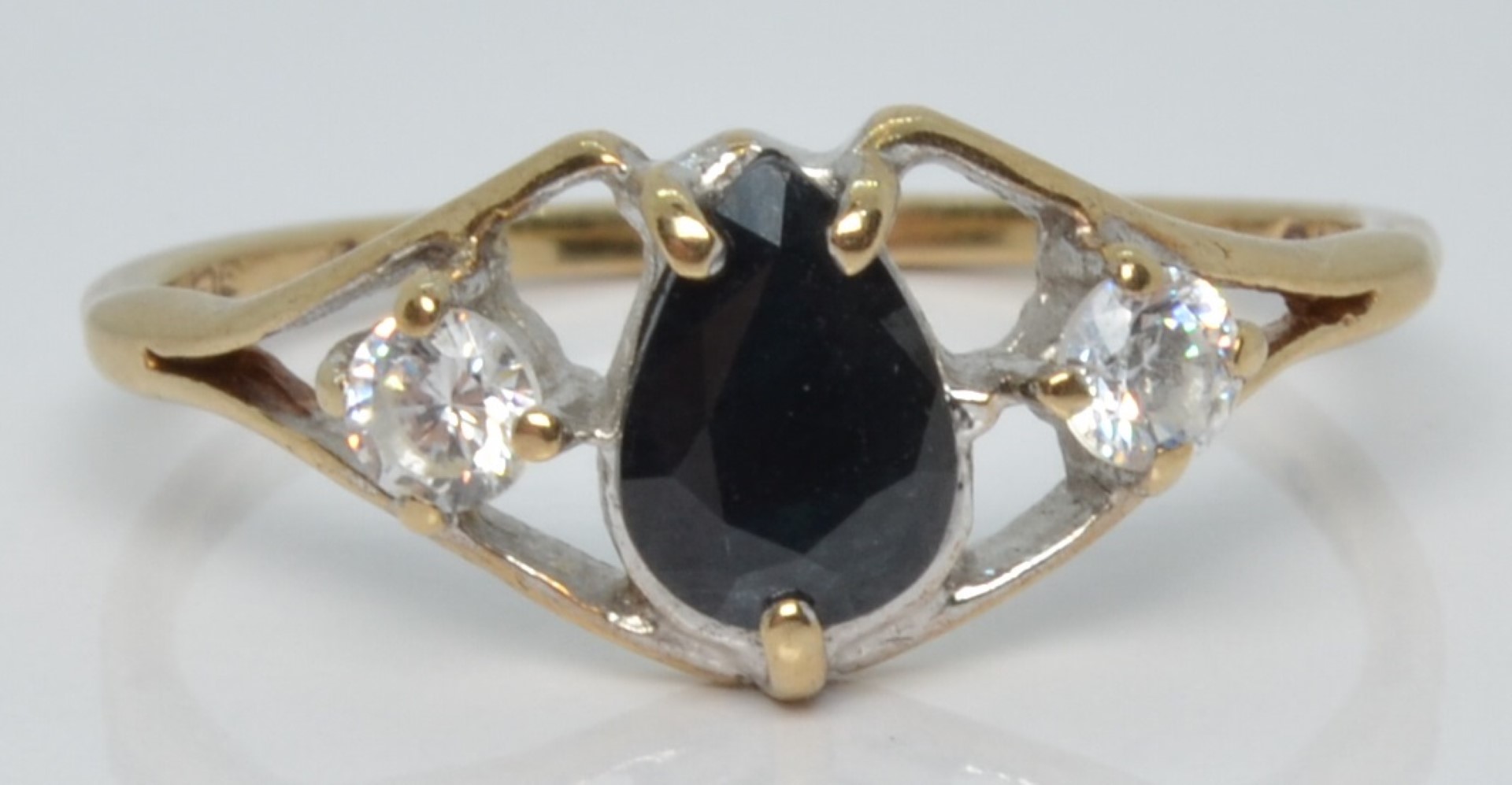A 9ct gold ring set with a pear cut sapphire and cubic zirconia, 1.9g, size R - Image 2 of 3