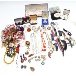 A collection of costume jewellery including watches, silver pocket watch, Victorian locket, carved