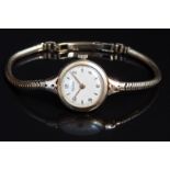 Rotary 9ct gold ladies wristwatch with gold hand, Arabic numerals and hour markers, cream dial and