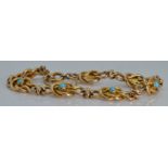 WITHDRAWN   Edwardian yellow metal knot bracelet set with turquoise, 13.2g