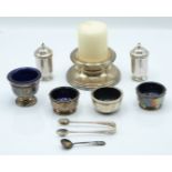 Art Deco hallmarked silver four piece cruet set comprising two open salts with blue glass liners and