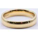 An 18ct gold wedding band/ ring, 5.7g, size L/M
