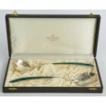 David Andersen cased pair of Norwegian silver gilt and green guilloché enamel salad servers,