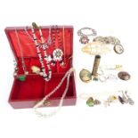 A collection of jewellery including buckles, silver pendants, silver brooches, Art Deco crystal