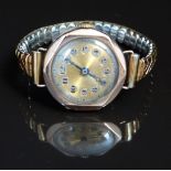 Comex 9ct gold ladies wristwatch with inset subsidiary seconds dial, gold hands, Arabic numerals and